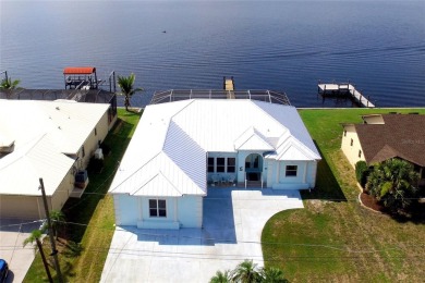 Welcome to your riverfront oasis on the scenic Peace River--a on Deep Creek Golf Club in Florida - for sale on GolfHomes.com, golf home, golf lot