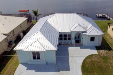 Welcome to your riverfront oasis on the scenic Peace River--a on Deep Creek Golf Club in Florida - for sale on GolfHomes.com, golf home, golf lot