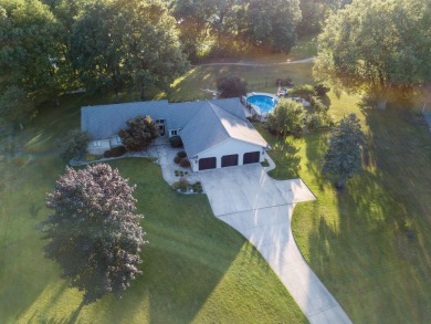 This extraordinary property boasts three spacious bedrooms on Pine View Golf Club in Michigan - for sale on GolfHomes.com, golf home, golf lot