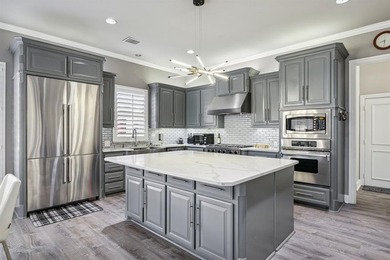 This exceptional estate in Castle Hills Golf and Country Club is on The Lakes at Castle Hill Golf Club in Texas - for sale on GolfHomes.com, golf home, golf lot