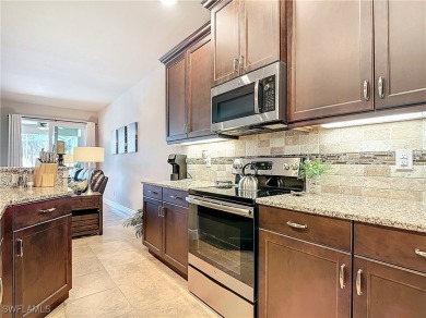 Stunning Custom-Built Lilac Model Home with Saltwater Pool and on Herons Glen Golf and Country Club in Florida - for sale on GolfHomes.com, golf home, golf lot