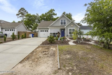 Are you ready for the coastal lifestyle? This impeccably on Founders Club At St. James Plantation in North Carolina - for sale on GolfHomes.com, golf home, golf lot