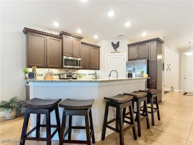 Stunning Custom-Built Lilac Model Home with Saltwater Pool and on Herons Glen Golf and Country Club in Florida - for sale on GolfHomes.com, golf home, golf lot
