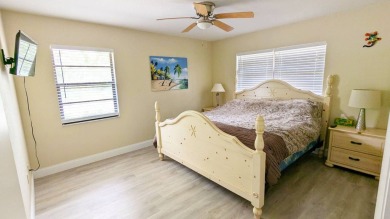 Welcome to this beautifully maintained 2-bedroom, 2-bathroom on Placid Lakes Country Club in Florida - for sale on GolfHomes.com, golf home, golf lot
