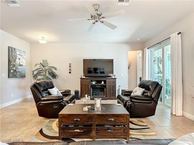 Stunning Custom-Built Lilac Model Home with Saltwater Pool and on Herons Glen Golf and Country Club in Florida - for sale on GolfHomes.com, golf home, golf lot