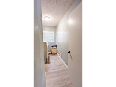Welcome to this beautifully maintained 2-bedroom, 2-bathroom on Placid Lakes Country Club in Florida - for sale on GolfHomes.com, golf home, golf lot