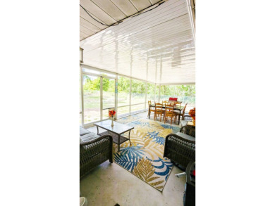 Welcome to this beautifully maintained 2-bedroom, 2-bathroom on Placid Lakes Country Club in Florida - for sale on GolfHomes.com, golf home, golf lot