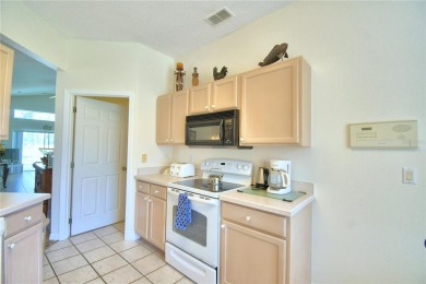 GOLF COURSE VIEW POOL HOME! Enjoy this FURNISHED 4 Bedroom/2 on Southern Dunes Golf and Country Club in Florida - for sale on GolfHomes.com, golf home, golf lot