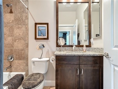 Stunning Custom-Built Lilac Model Home with Saltwater Pool and on Herons Glen Golf and Country Club in Florida - for sale on GolfHomes.com, golf home, golf lot