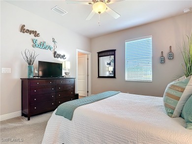 Stunning Custom-Built Lilac Model Home with Saltwater Pool and on Herons Glen Golf and Country Club in Florida - for sale on GolfHomes.com, golf home, golf lot