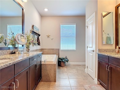 Stunning Custom-Built Lilac Model Home with Saltwater Pool and on Herons Glen Golf and Country Club in Florida - for sale on GolfHomes.com, golf home, golf lot