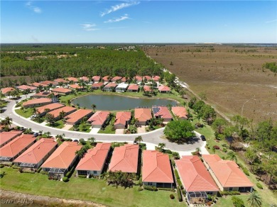 Stunning Custom-Built Lilac Model Home with Saltwater Pool and on Herons Glen Golf and Country Club in Florida - for sale on GolfHomes.com, golf home, golf lot