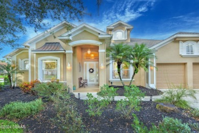 Welcome to your dream pool home nestled in the serene community on Halifax Plantation Golf Club in Florida - for sale on GolfHomes.com, golf home, golf lot