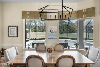 An exquisite residence situated within the gated Portofino on Venetian Bay Golf Course in Florida - for sale on GolfHomes.com, golf home, golf lot