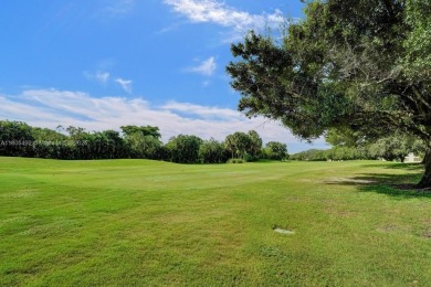 This 2 bedroom 2 bathroom 4th floor Whitehall Condo overlooking on Pine Island Ridge Country Club in Florida - for sale on GolfHomes.com, golf home, golf lot