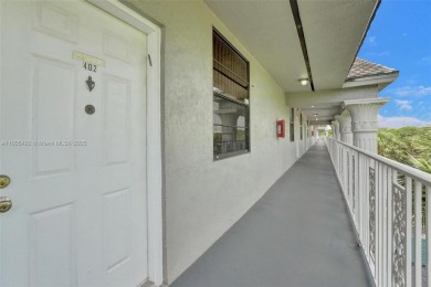 This 2 bedroom 2 bathroom 4th floor Whitehall Condo overlooking on Pine Island Ridge Country Club in Florida - for sale on GolfHomes.com, golf home, golf lot
