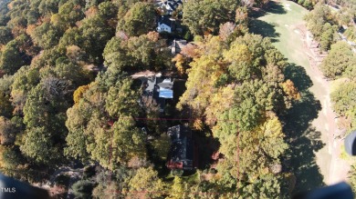 Priced below tax value, this property offers the perfect on MacGregor Downs Country Club in North Carolina - for sale on GolfHomes.com, golf home, golf lot
