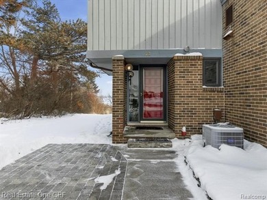 Experience the ultimate in affordable waterfront luxury with on St Clair River Country Club in Michigan - for sale on GolfHomes.com, golf home, golf lot