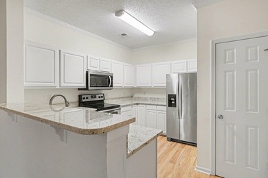 Fantastic three-bedroom, two bath GROUND FLOOR UNIT in Colonial on Palmetto Greens Golf and Country Club in South Carolina - for sale on GolfHomes.com, golf home, golf lot