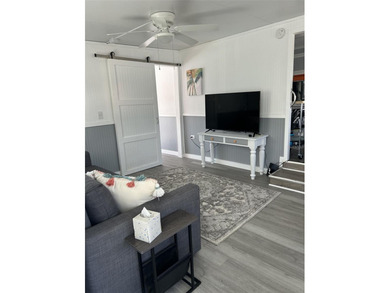 Welcome to Kove Estates a 55+ gated community located between on Cypress Point RV Golf Club in Florida - for sale on GolfHomes.com, golf home, golf lot