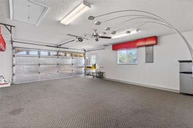EXCEPTIONAL GARAGE AND WORKSHOP SPACE IDEAL FOR HOBBYISTS OR on The Links of Spruce Creek in Florida - for sale on GolfHomes.com, golf home, golf lot