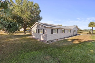 EXCEPTIONAL GARAGE AND WORKSHOP SPACE IDEAL FOR HOBBYISTS OR on The Links of Spruce Creek in Florida - for sale on GolfHomes.com, golf home, golf lot