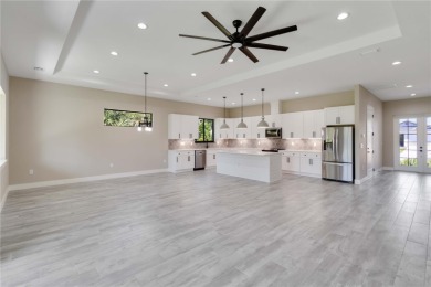 This brand-new, custom-built residence is nestled in the serene on Rotonda Golf and Country Club The Palms Course in Florida - for sale on GolfHomes.com, golf home, golf lot