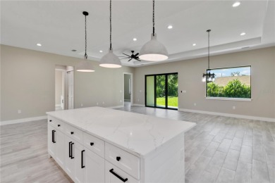 This brand-new, custom-built residence is nestled in the serene on Rotonda Golf and Country Club The Palms Course in Florida - for sale on GolfHomes.com, golf home, golf lot
