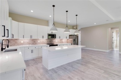 This brand-new, custom-built residence is nestled in the serene on Rotonda Golf and Country Club The Palms Course in Florida - for sale on GolfHomes.com, golf home, golf lot