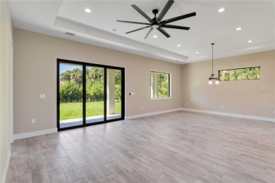 This brand-new, custom-built residence is nestled in the serene on Rotonda Golf and Country Club The Palms Course in Florida - for sale on GolfHomes.com, golf home, golf lot