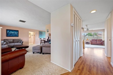 Very spacious 2 bedroom, 2 bath, 2-car garage corner lot home in on Jacaranda West Country Club in Florida - for sale on GolfHomes.com, golf home, golf lot