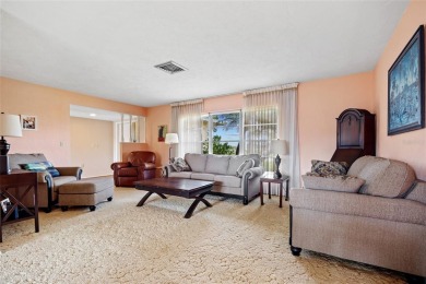 Very spacious 2 bedroom, 2 bath, 2-car garage corner lot home in on Jacaranda West Country Club in Florida - for sale on GolfHomes.com, golf home, golf lot