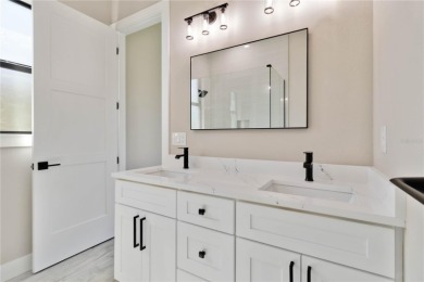 This brand-new, custom-built residence is nestled in the serene on Rotonda Golf and Country Club The Palms Course in Florida - for sale on GolfHomes.com, golf home, golf lot