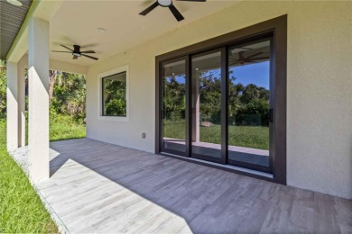 This brand-new, custom-built residence is nestled in the serene on Rotonda Golf and Country Club The Palms Course in Florida - for sale on GolfHomes.com, golf home, golf lot