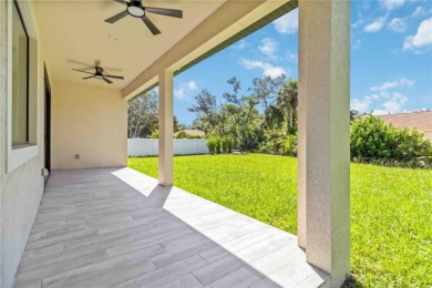 This brand-new, custom-built residence is nestled in the serene on Rotonda Golf and Country Club The Palms Course in Florida - for sale on GolfHomes.com, golf home, golf lot