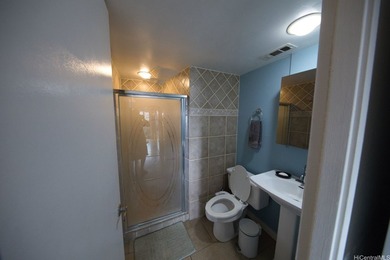 Enjoy island living from this spacious two-bedroom, two-bath on Ala Wai Golf Course in Hawaii - for sale on GolfHomes.com, golf home, golf lot