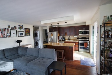 Enjoy island living from this spacious two-bedroom, two-bath on Ala Wai Golf Course in Hawaii - for sale on GolfHomes.com, golf home, golf lot