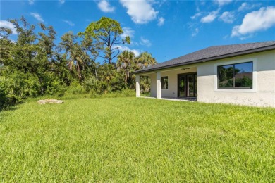 This brand-new, custom-built residence is nestled in the serene on Rotonda Golf and Country Club The Palms Course in Florida - for sale on GolfHomes.com, golf home, golf lot