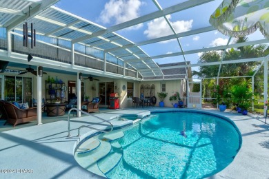 Exquisite 3-Bedroom, 2-Bath Pool Home in prestigious 24/7 staff on Spruce Creek Golf Club in Florida - for sale on GolfHomes.com, golf home, golf lot