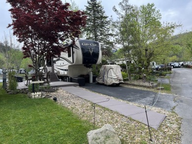 Beautiful lakefront lot with ornamental tree and nice patio for on Bent Creek Golf Course in Tennessee - for sale on GolfHomes.com, golf home, golf lot