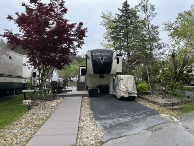 Beautiful lakefront lot with ornamental tree and nice patio for on Bent Creek Golf Course in Tennessee - for sale on GolfHomes.com, golf home, golf lot