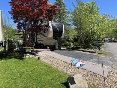 Beautiful lakefront lot with ornamental tree and nice patio for on Bent Creek Golf Course in Tennessee - for sale on GolfHomes.com, golf home, golf lot
