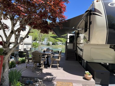 Beautiful lakefront lot with ornamental tree and nice patio for on Bent Creek Golf Course in Tennessee - for sale on GolfHomes.com, golf home, golf lot