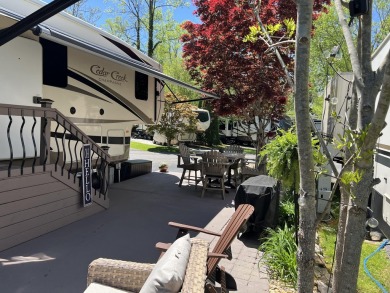 Beautiful lakefront lot with ornamental tree and nice patio for on Bent Creek Golf Course in Tennessee - for sale on GolfHomes.com, golf home, golf lot