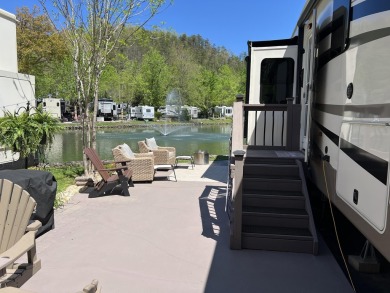 Beautiful lakefront lot with ornamental tree and nice patio for on Bent Creek Golf Course in Tennessee - for sale on GolfHomes.com, golf home, golf lot