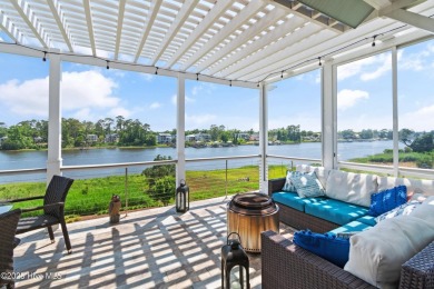 This modern luxury home offers a spectacular waterfront on Members Club At St. James Plantation in North Carolina - for sale on GolfHomes.com, golf home, golf lot