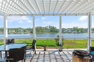 This modern luxury home offers a spectacular waterfront on Members Club At St. James Plantation in North Carolina - for sale on GolfHomes.com, golf home, golf lot