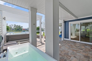 This modern luxury home offers a spectacular waterfront on Members Club At St. James Plantation in North Carolina - for sale on GolfHomes.com, golf home, golf lot