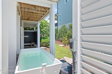 This modern luxury home offers a spectacular waterfront on Members Club At St. James Plantation in North Carolina - for sale on GolfHomes.com, golf home, golf lot