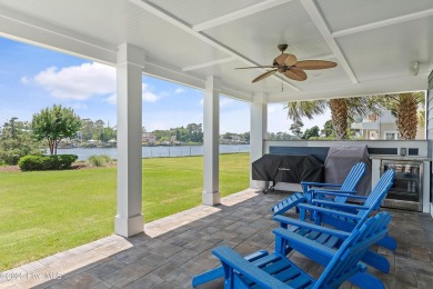 This modern luxury home offers a spectacular waterfront on Members Club At St. James Plantation in North Carolina - for sale on GolfHomes.com, golf home, golf lot